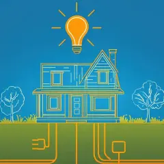 Ilustracja domu z żarówką nad nim symbolizuje efektywność energetyczną budynku. Pod ziemią widoczne są przewody elektryczne.