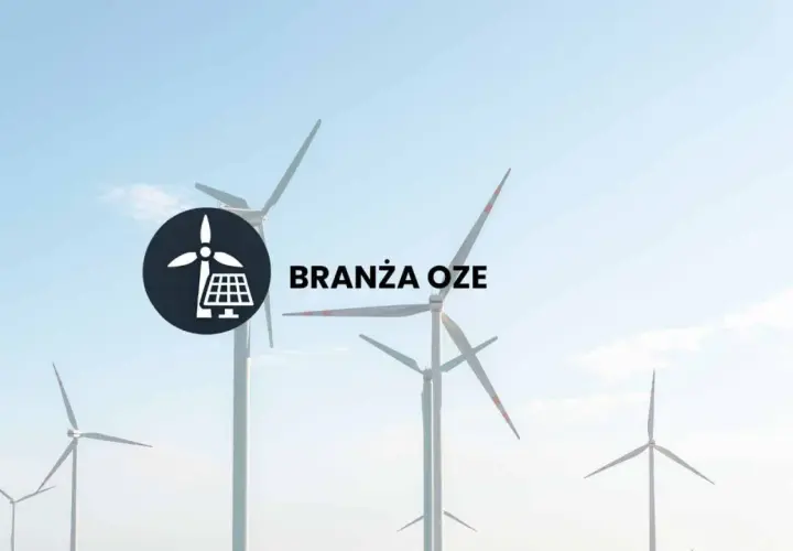 Wiatraki i panele słoneczne symbolizują branżę OZE. Dowiedz się, co to jest OZE i jak wpływa na przyszłość energetyki.